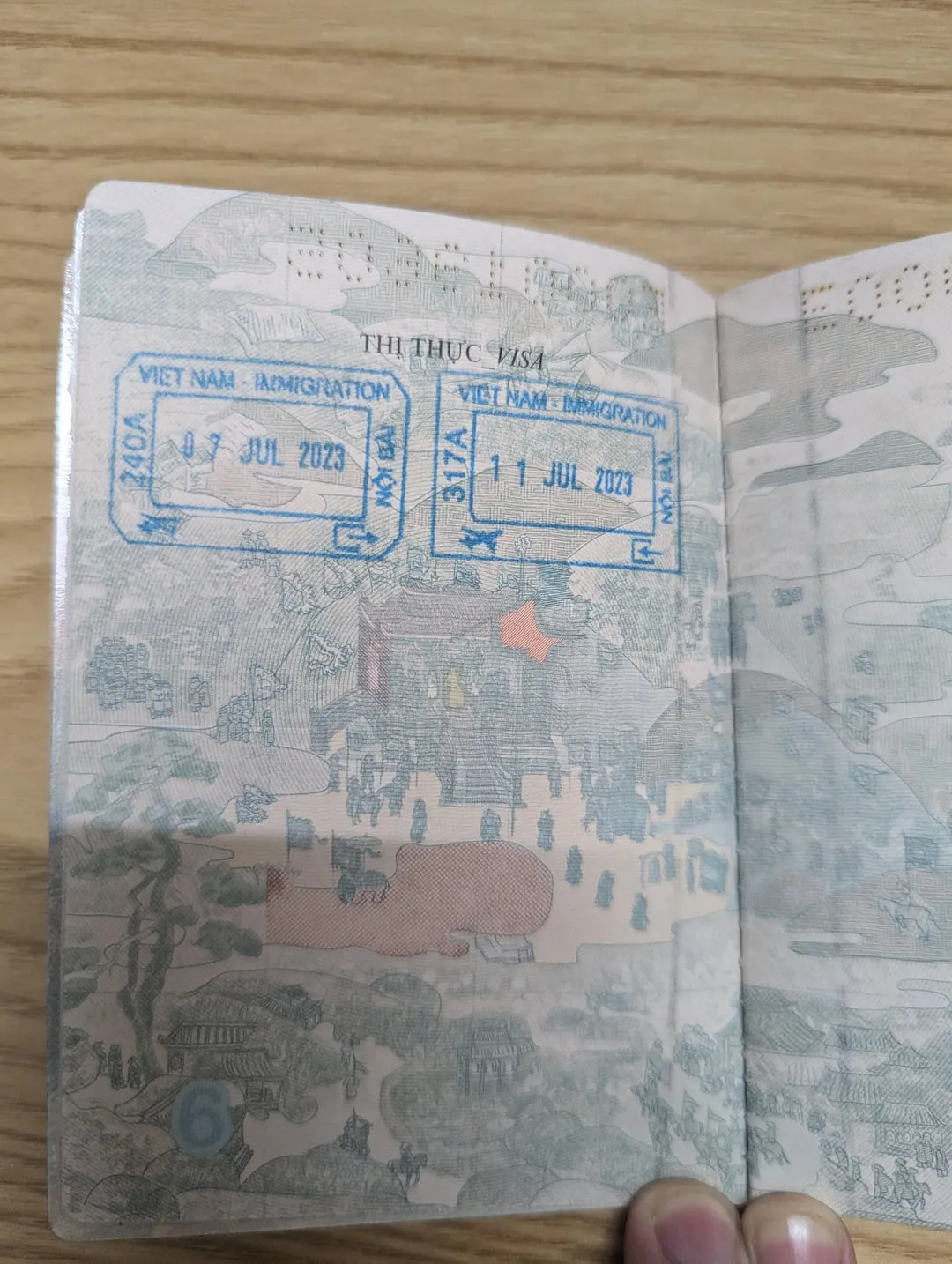 Passport with Vietnam visa stamp