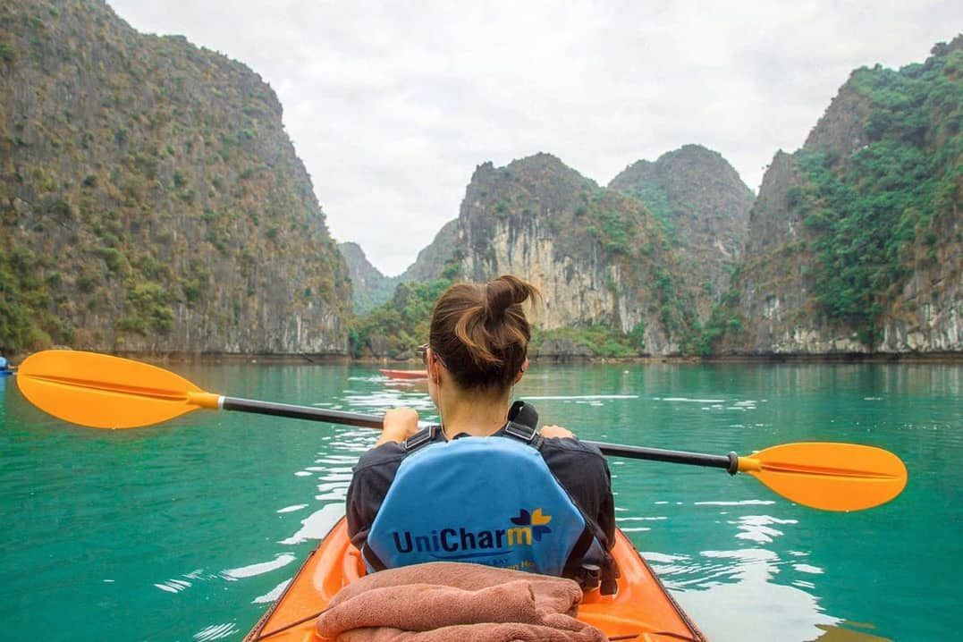 Tourists kayaking in Halong Bay, Vietnam